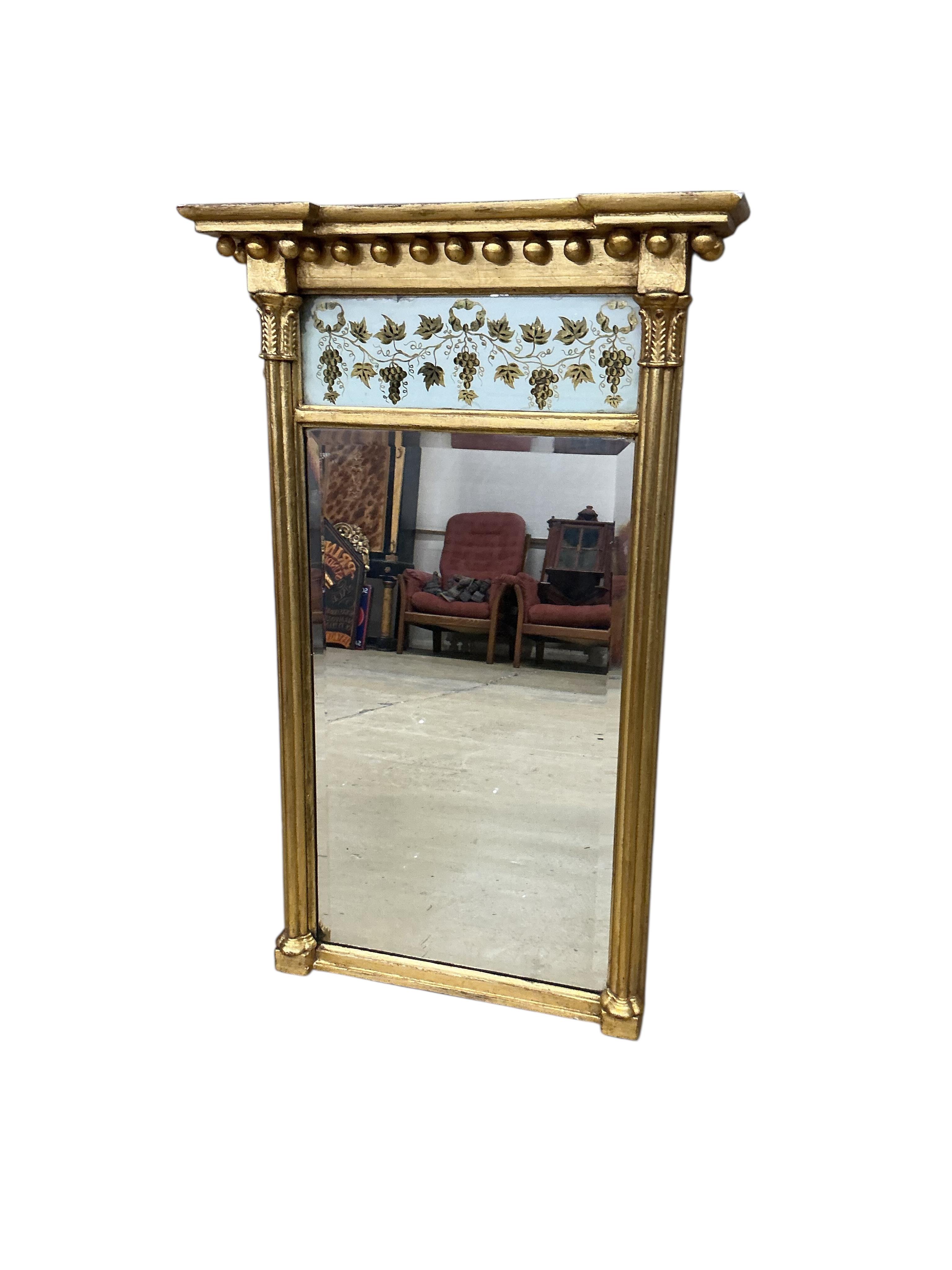 A Regency giltwood and composition pier glass, width 52cm, height 84cm
